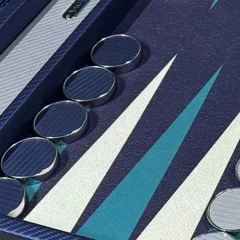 Chrome-plated checkers on the points of a blue board