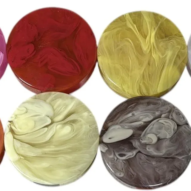 Red, yellow, cream and brown marbled polyester checkers side by side